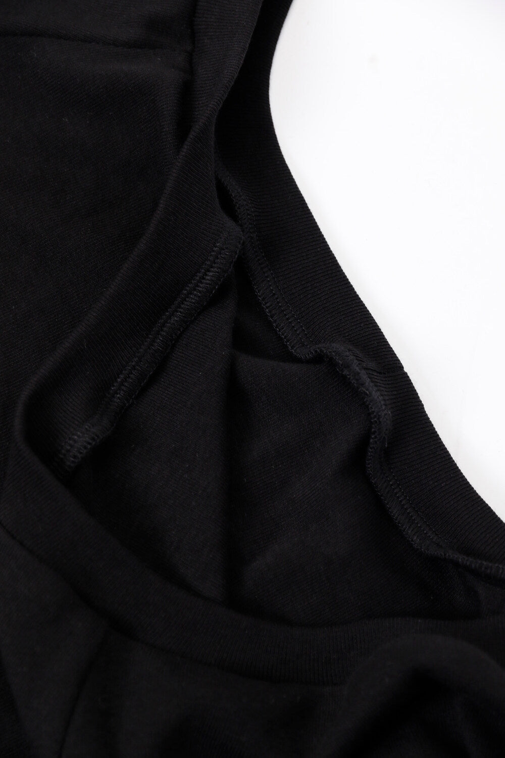 AIXILI Asymmetrical Hem Slim-Fit Knit Top
