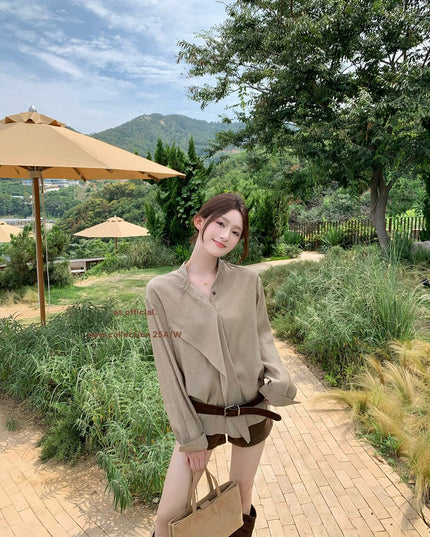 AS OFFICIAL Ruffled High-Neck Tie Blouse